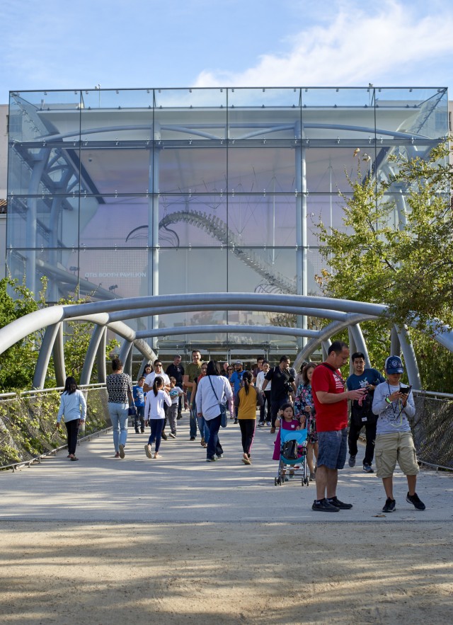 people in front of otis booth pavilion and elaine leventhal bridge NHM
