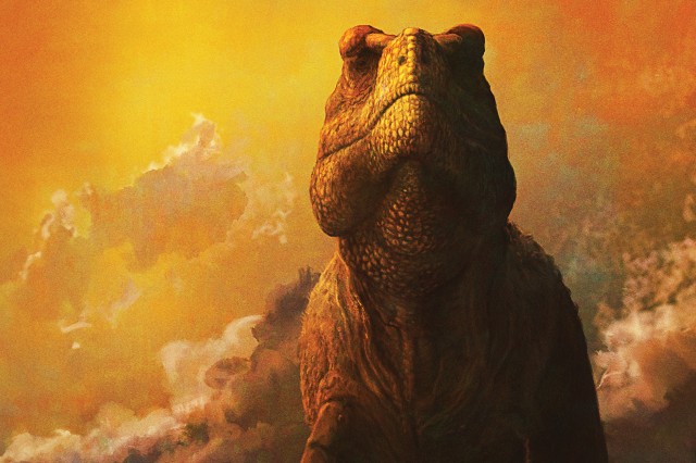 Yellow and orange cloudy sky behind a brown, scaly T. rex dinosaur head and should