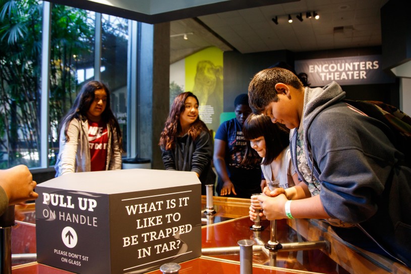kids interacting with tar pull
