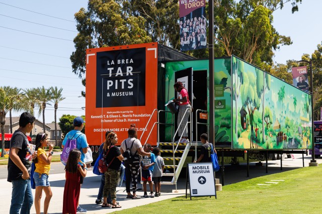 Crowds wait for entrance in the new Tar Pits Mobile Museum