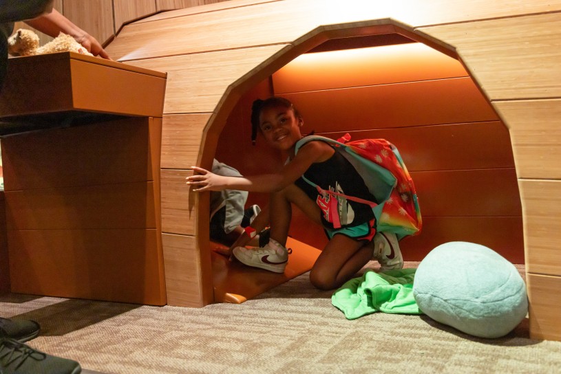 A girl explores the new Tar Pits Mobile Museum.