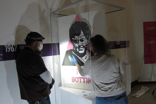 ACT UP sign install Rise Up LA exhibition