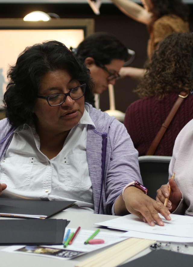 Teachers at the Paleo Puppetry Educator Workshop work on creating their puppets at La Brea Tar Pits