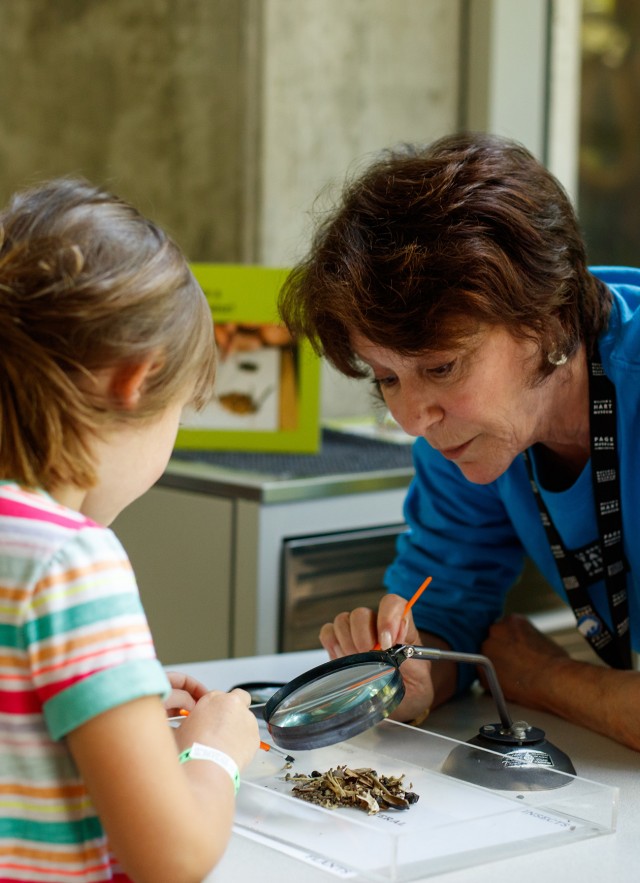 Volunteer with young girl