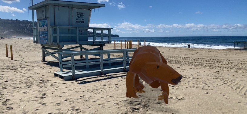 Digital sloth at the beach