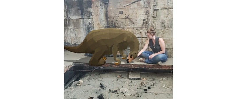 Shasta sloth and Tar Pits staff in an excavation pit